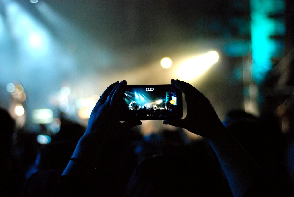 Modern concert hall with sleek design and dramatic stage lighting